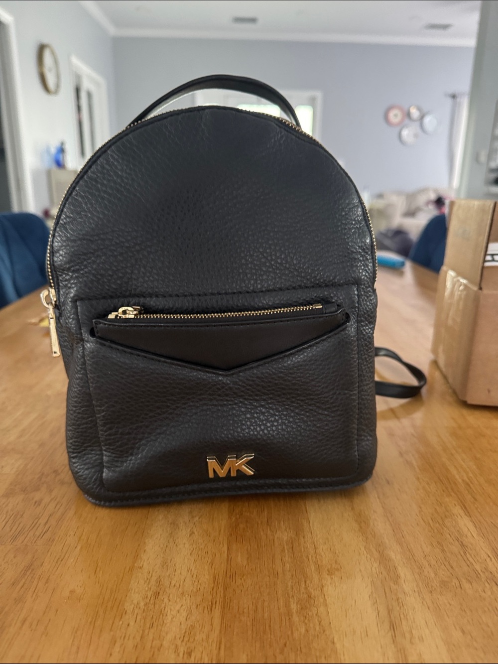 Michael Kors Black Pebbled Leather Mini Backpack with Gold MK Logo